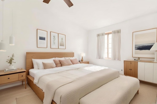 bedroom featuring ceiling fan and light hardwood / wood-style floors