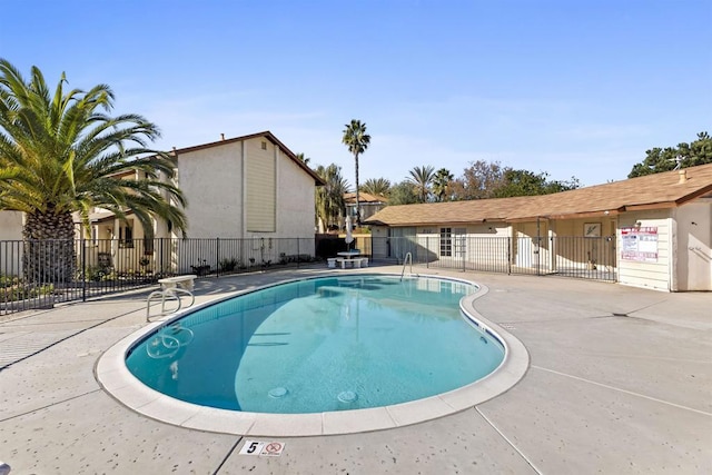 view of pool featuring a patio