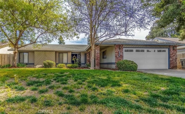 single story home featuring a front lawn and a garage