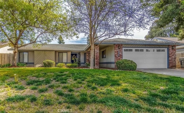 ranch-style house with a garage and a front yard