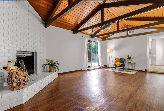 living room featuring a brick fireplace, dark wood-type flooring, wooden ceiling, and vaulted ceiling with beams