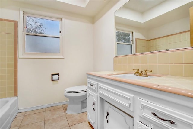 full bathroom featuring tile patterned flooring, vanity, plenty of natural light, and decorative backsplash