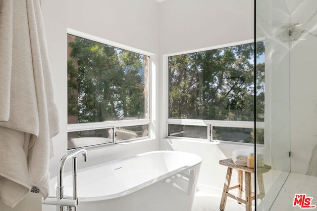 bathroom featuring a bath