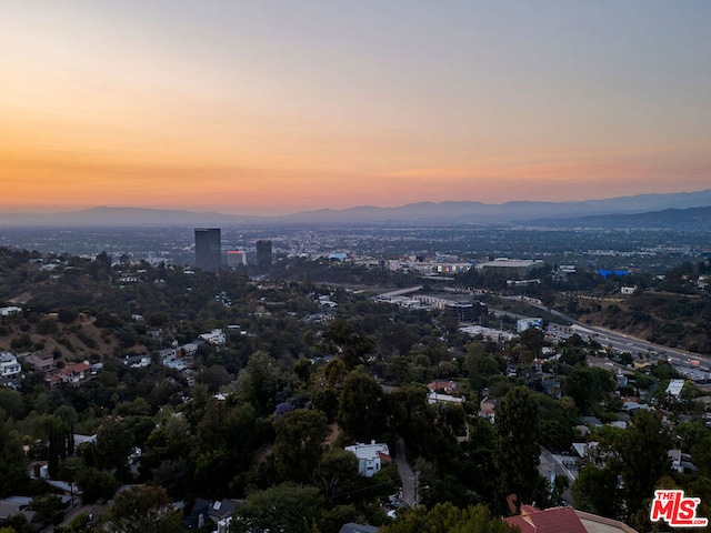 aerial view at dusk with a mountain view