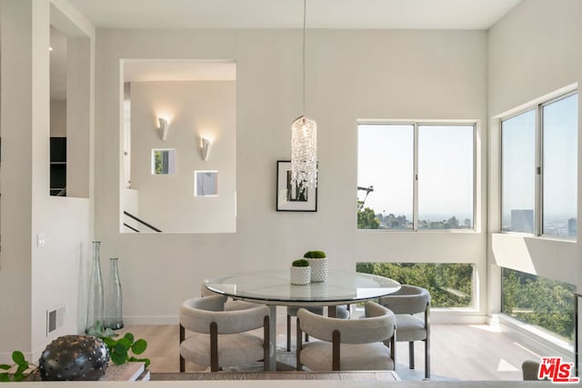 dining room with light wood-type flooring