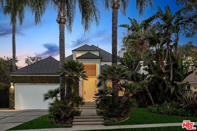 view of front of property featuring a garage