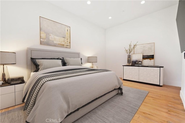 bedroom with light hardwood / wood-style flooring