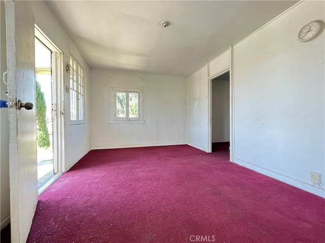 spare room with carpet flooring