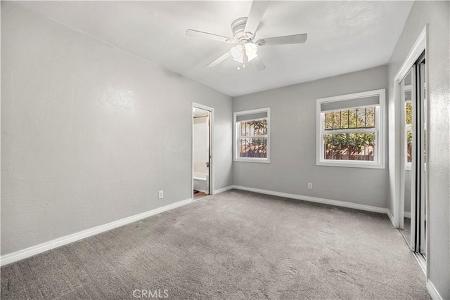 unfurnished bedroom featuring carpet flooring and ceiling fan