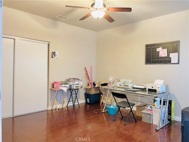 office area featuring ceiling fan and dark hardwood / wood-style floors