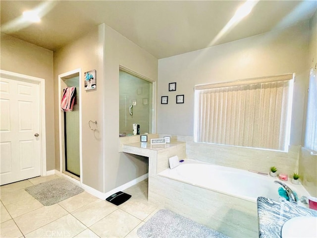 bathroom with plus walk in shower, tile patterned floors, and vanity