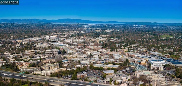 drone / aerial view featuring a mountain view