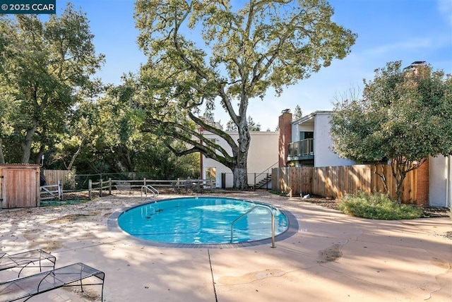 view of pool with a patio area