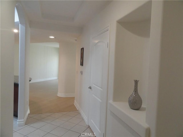 hallway with light tile patterned flooring