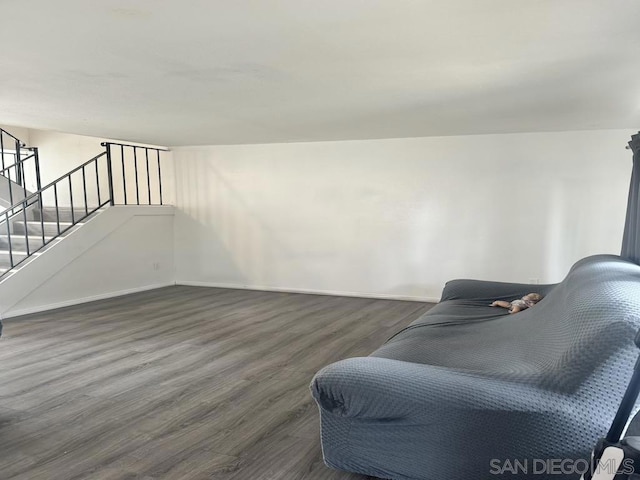 sitting room featuring dark hardwood / wood-style flooring