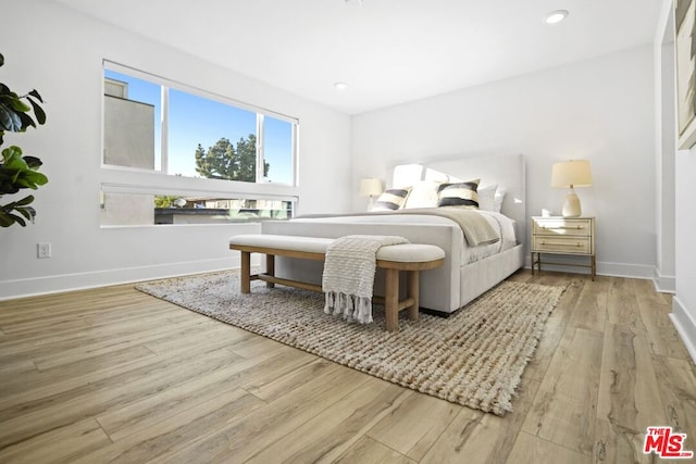 bedroom featuring light wood-type flooring