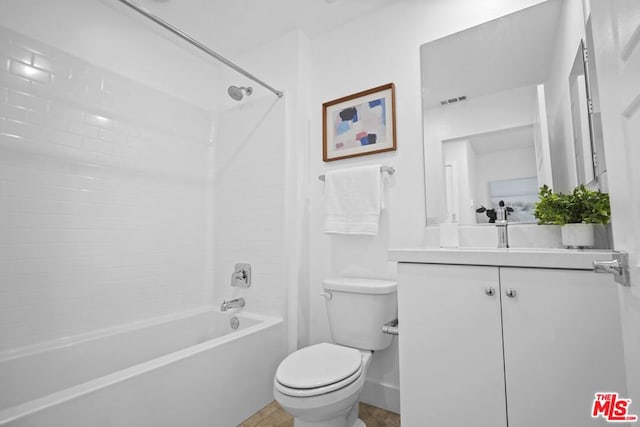 full bathroom with vanity, washtub / shower combination, and toilet