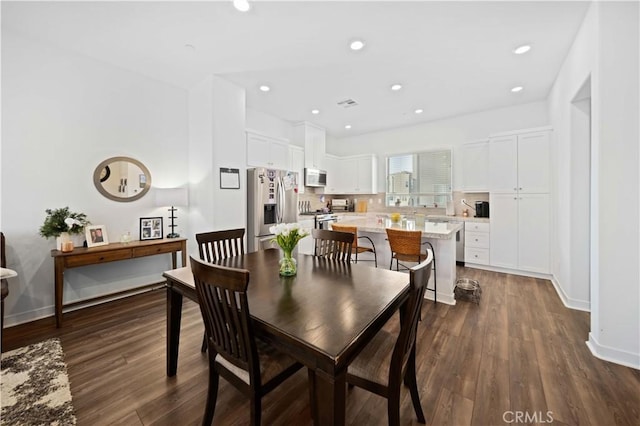 dining room featuring dark hardwood / wood-style flooring