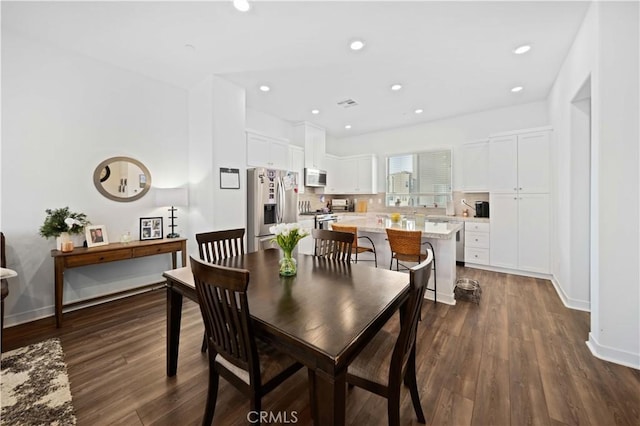 27014 Hummingbird Ln, Valencia, CA 91381 - dining space with baseboards, dark wood-style flooring, and recessed lighting