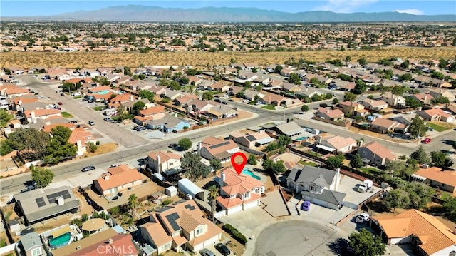 drone / aerial view featuring a mountain view