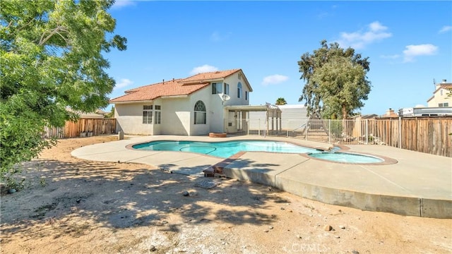 view of swimming pool with a pergola and a patio