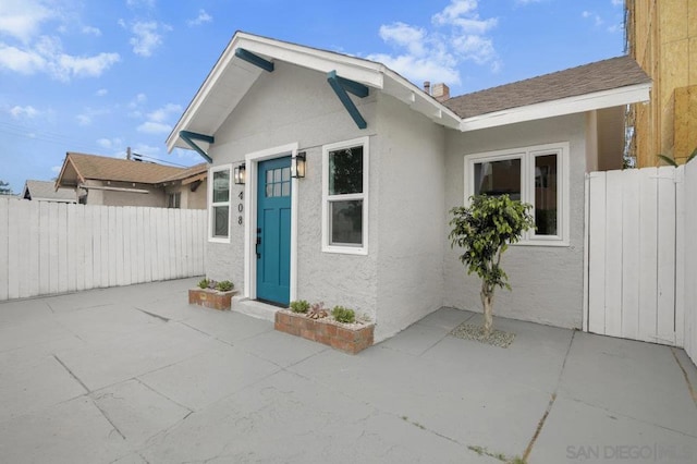 view of front of house with a patio