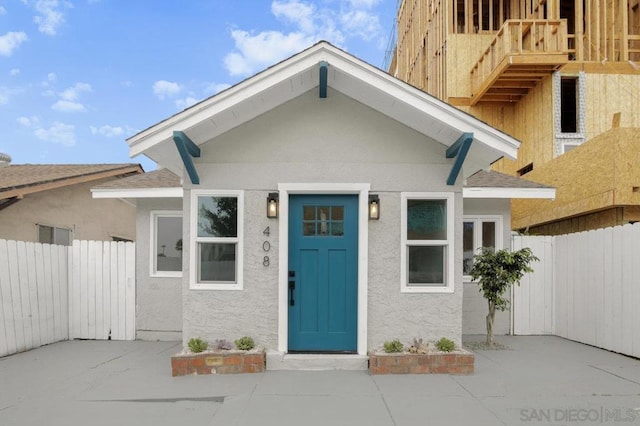 view of front of property with a patio