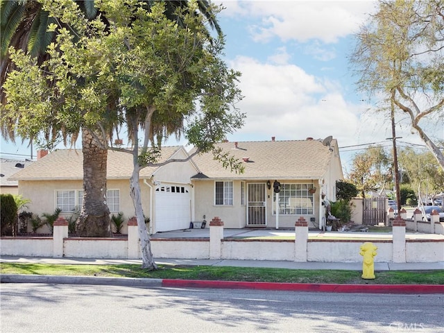 single story home featuring a garage