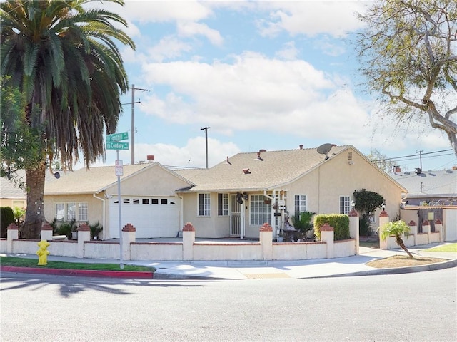 ranch-style house featuring a garage