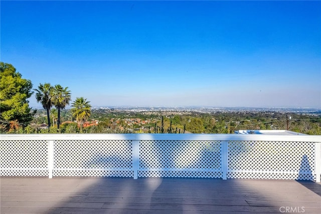 view of swimming pool with a deck