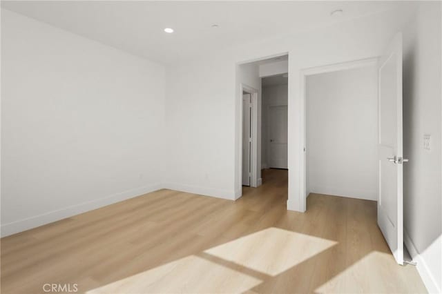 unfurnished bedroom featuring light hardwood / wood-style flooring