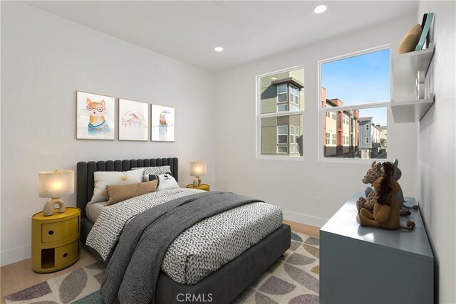 bedroom featuring light hardwood / wood-style flooring