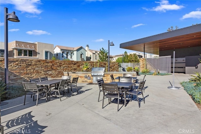 view of patio / terrace with an outdoor kitchen and area for grilling