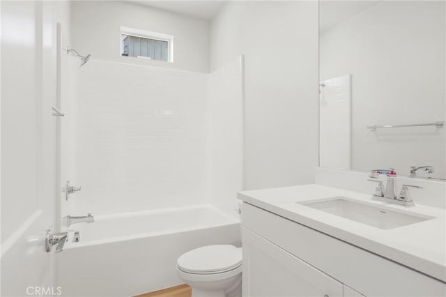 full bathroom featuring toilet, shower / washtub combination, and vanity