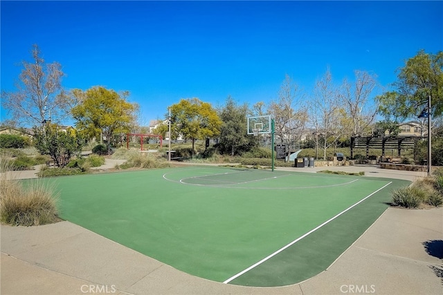 view of basketball court featuring a pergola