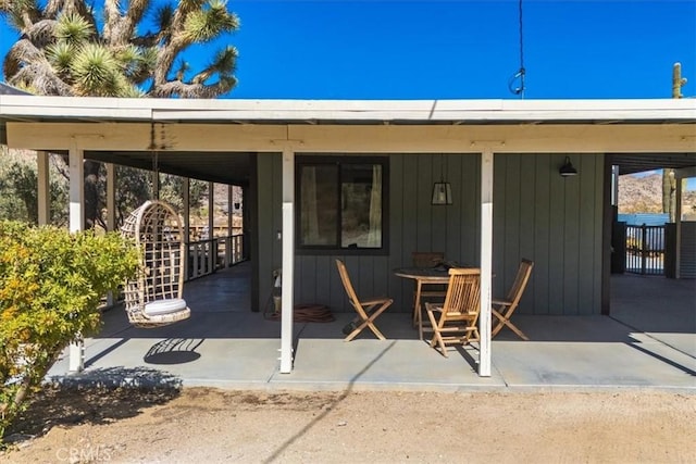 entrance to property with a patio area