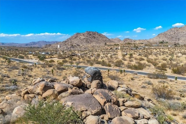 mountain view featuring view of desert