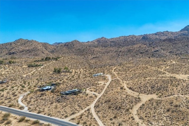 bird's eye view featuring a mountain view and a desert view