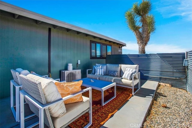 view of patio / terrace with outdoor lounge area and fence