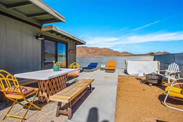 view of patio / terrace featuring an outdoor fire pit and outdoor dining area