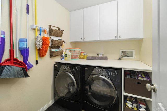 laundry room with cabinets and independent washer and dryer