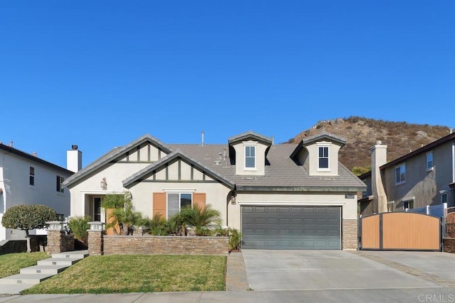 view of front of property featuring a garage