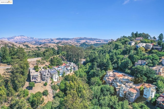 drone / aerial view featuring a mountain view