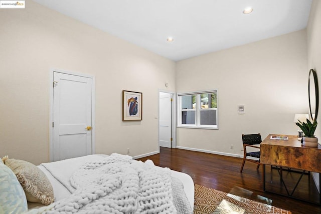 bedroom featuring dark hardwood / wood-style floors