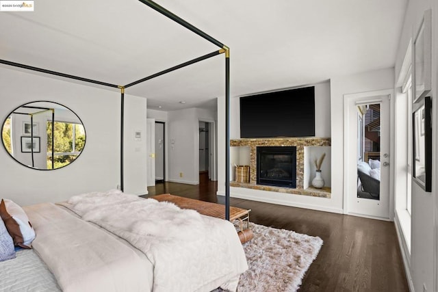 bedroom featuring a closet and dark hardwood / wood-style floors