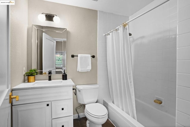 full bathroom with toilet, vanity, and shower / bathtub combination with curtain