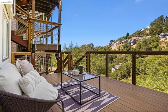 deck with an outdoor hangout area