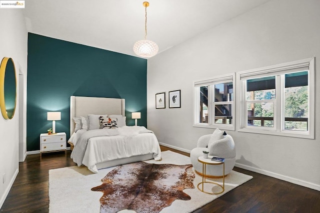 bedroom featuring dark hardwood / wood-style floors