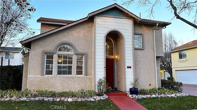 view of front of home featuring stucco siding