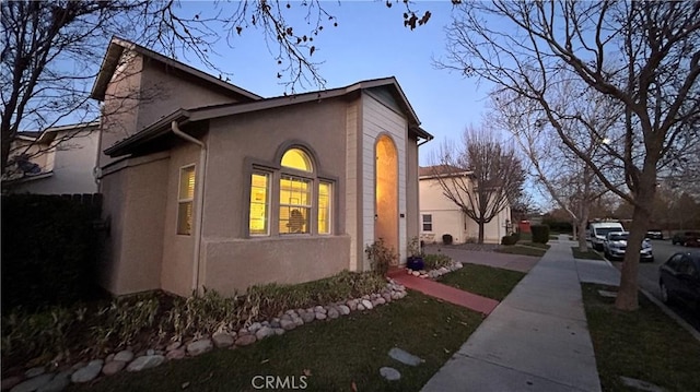 view of home's exterior featuring stucco siding